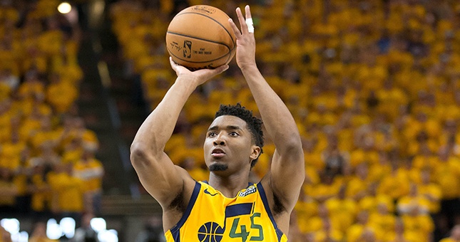 Utah Jazz guard Donovan Mitchell (45) shoots a free throw late during the second half of game six of the first round of the 2018 NBA Playoffs against the Oklahoma City Thunder at Vivint Smart Home Arena.