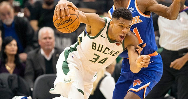Milwaukee Bucks forward Giannis Antetokounmpo (34) drives for the basket against New York Knicks guard Damyean Dotson (21) during the third quarter at Wisconsin Entertainment and Sports Center.