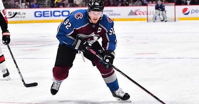 Colorado Avalanche left wing Gabriel Landeskog (92) controls the puck in the second period against the Ottawa Senators at the Pepsi Center.