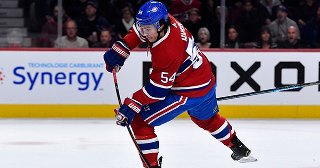 Montreal Canadiens forward Charles Hudon (54) shoots the puck against the Dallas Stars during the first period at the Bell Centre.