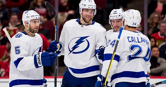 Tampa Bay Lightning defenseman Victor Hedman (second to left) celebrates his goal with teammates during the third period against the Chicago Blackhawks at United Center.