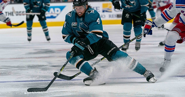 San Jose Sharks defenseman Brenden Dillon (4) controls the puck during the first period against the New York Rangers at SAP Center at San Jose.