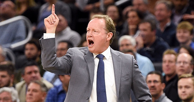 Milwaukee Bucks head coach Mike Budenholzer calls a play in the second quarter during the game against the Toronto Raptors at the Fiserv Forum.