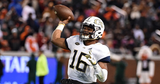 Georgia Tech Yellow Jackets quarterback TaQuon Marshall (16) looks to throw against the Miami Hurricanes during the second half at Bobby Dodd Stadium.