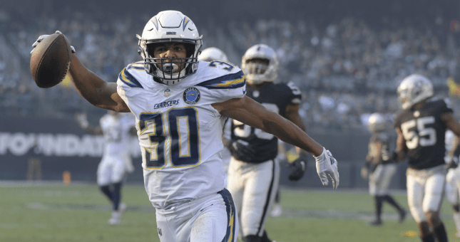 Los Angeles Chargers running back Austin Ekeler (30) carries the ball in the third quarter against the Oakland Raiders.