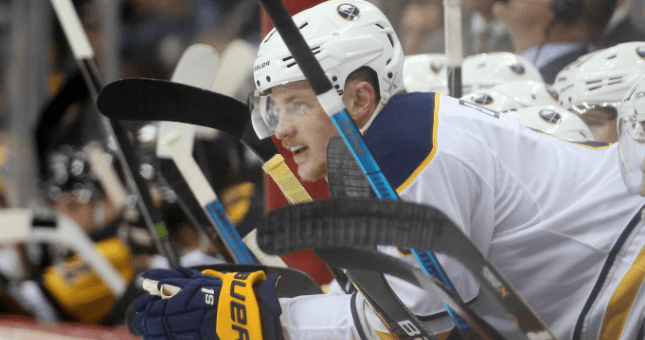 Buffalo Sabres center Jack Eichel (9) looks on from the Sabres bench against the Pittsburgh Penguins.