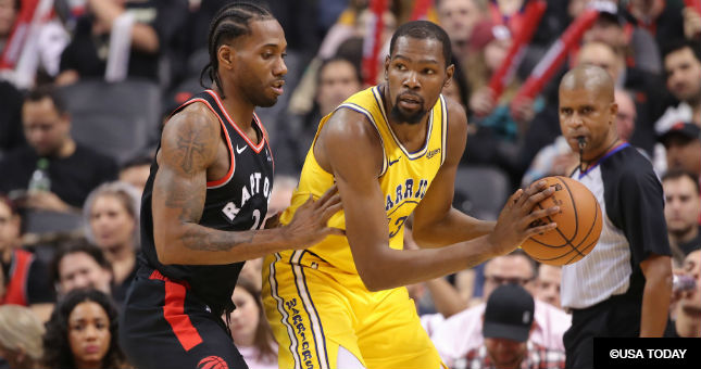 Toronto Raptors forward Kawhi Leonard (2) guards Golden State Warriors forward Kevin Durant (35).