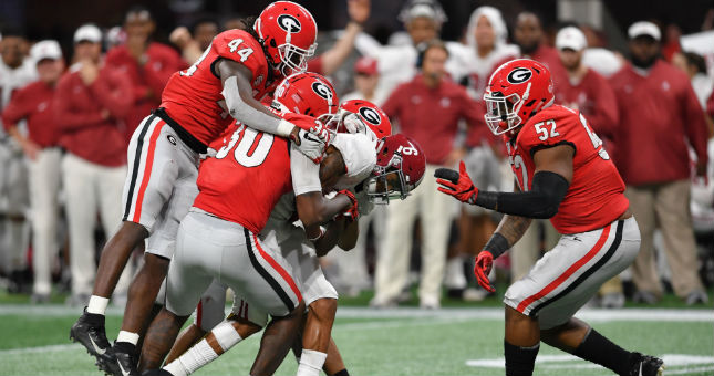 Georgia tackles Alabama wide receiver DeVonta Smith (6) in the SEC title game.