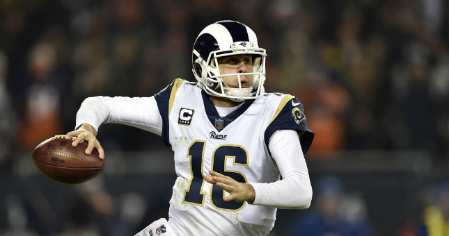 Los Angeles Rams quarterback Jared Goff (16) looks to pass against the Chicago Bears at Soldier Field.
