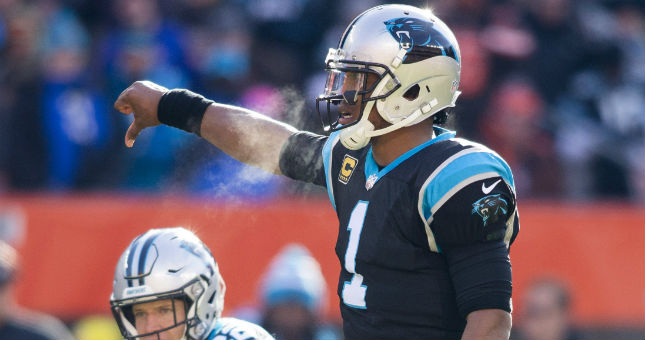 Carolina Panthers quarterback Cam Newton (1) signals at the line of scrimmage during the first quarter against the Cleveland Browns