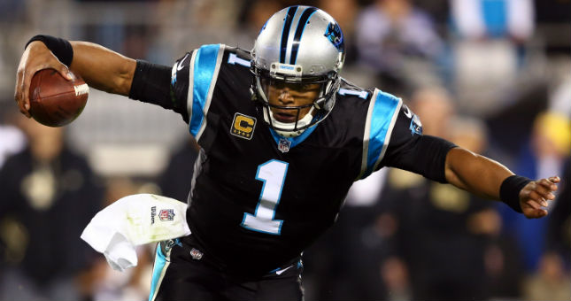 Carolina Panthers quarterback Cam Newton (1) carries the ball in the second quarter against the New Orleans Saints.