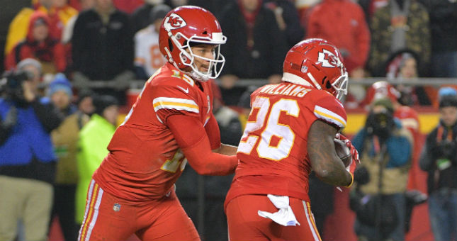 Kansas City Chiefs running back Damien Williams (26) celebrates with running back Austin Ekeler (right) after scoring during the second half against the Los Angeles Chargers.