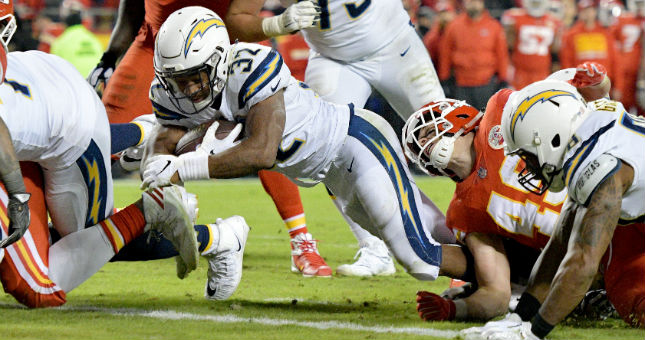 Los Angeles Chargers running back Justin Jackson (32) dives in for a touchdown during the second half against the Kansas City Chiefs at Arrowhead Stadium.