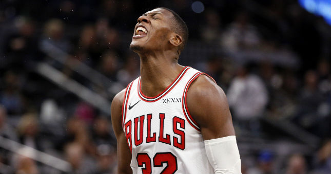 Chicago Bulls point guard Kris Dunn (32) reacts after a shot during the second half against the San Antonio Spurs.