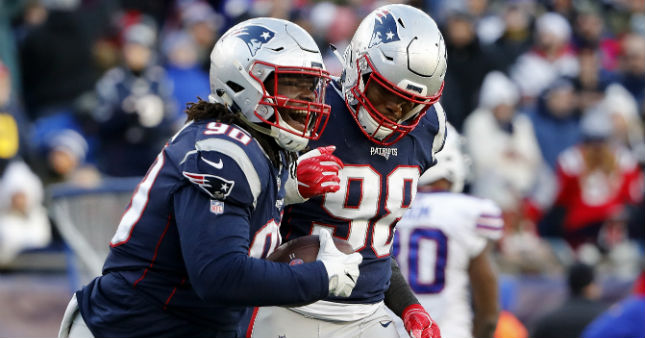 New England Patriots defensive tackle Malcom Brown (90) celebrates with defensive end Trey Flowers (98).
