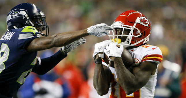Kansas City Chiefs wide receiver Tyreek Hill (10) catches a pass against Seattle Seahawks cornerback Justin Coleman.