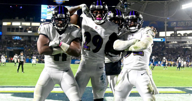 Baltimore Ravens cornerback Marlon Humphrey (29) celebrates with defensive back Anthony Levine (41), strong safety Tony Jefferson (23) and free safety Eric Weddle (32).