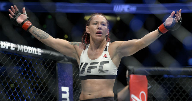 Cris Cyborg reacts following her victory against Tonya Evinger during UFC 214.
