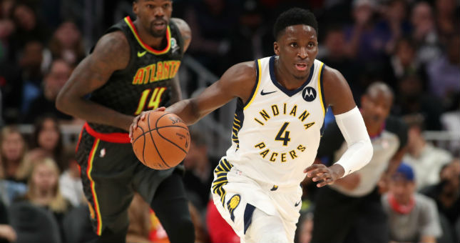 Pacers guard Victor Oladipo (4) pushes the ball up the court.