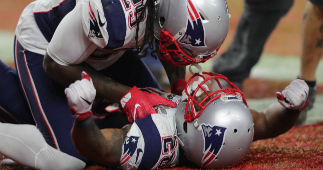Patriots running back LeGarrette Blount (29) and running back James White (28) celebrate their win over Atlanta Falcons during Super Bowl LI at NRG Stadium.