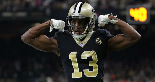 Saints wide receiver Michael Thomas (13) reacts after running for a first down against the Eagles.