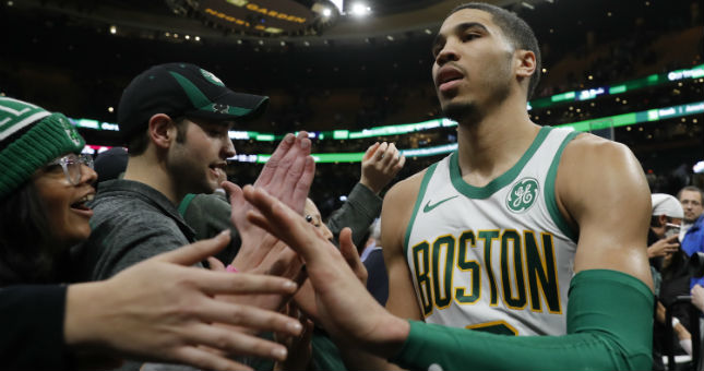 Celtics forward Jayson Tatum (0) exits the court after a game against the Toronto Raptors at TD Garden.
