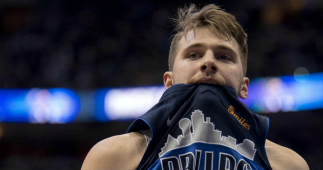 Mavericks forward Luka Doncic (77) reacts to a foul call during the second half against the Toronto Raptors.