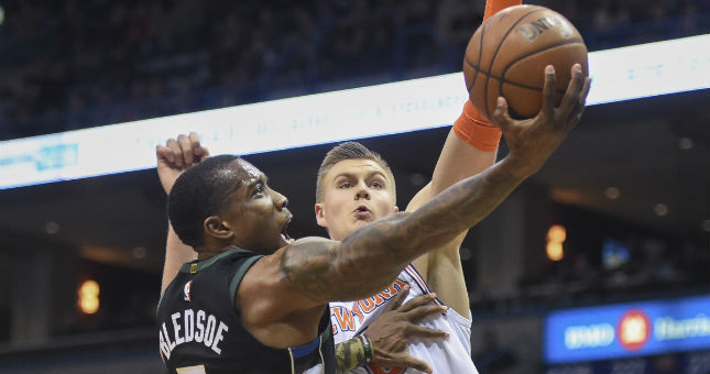 Bucks guard Eric Bledsoe (6) takes a shot against New York Knicks forward Kristaps Porzingis (6) last season.