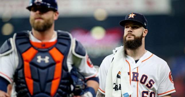 Dallas Keuchel walks to the dugout prior to Game 3 of the 2018 ALCS against the Boston Red Sox.