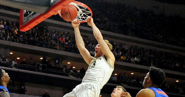 This game will be tight, but give the slight edge to the Wolverines.