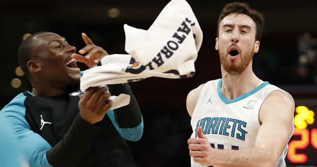 The Charlotte Hornets celebrate their win Sunday at Detroit. The result kept their playoff hopes alive heading into the final two games of the season.