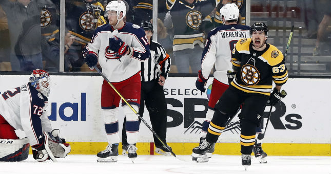 Brad Marchand scores a goal against the Blue Jackets.