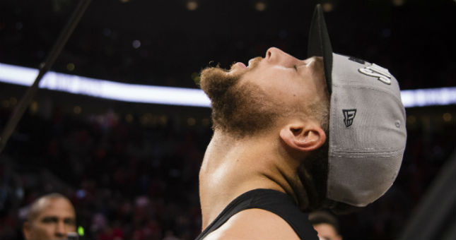 Steph Curry looks to the sky after the Warriors advanced to their fifth straight NBA Finals.